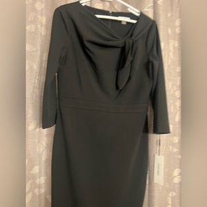 A feminine bow sophisticated scuba-crepe fabric